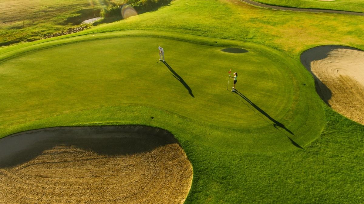 aerial view of golfers on the green at Ba Na Hills Golf Club