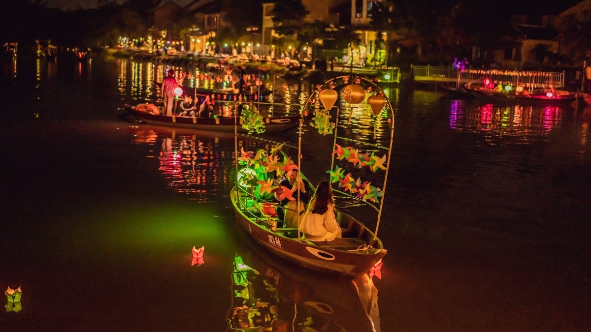 take a boat ride on the hoai or thu bon river in hoi an